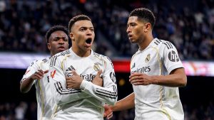 Kylian Mbappé e Neymar Jr em campo, destacando a discussão sobre a presença na Copa do Mundo de 2026.