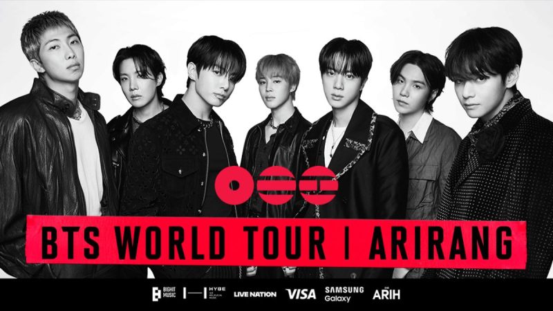 Membros do grupo BTS em performance; destaque para anúncio de show no Brasil e venda de ingressos no Morumbis.