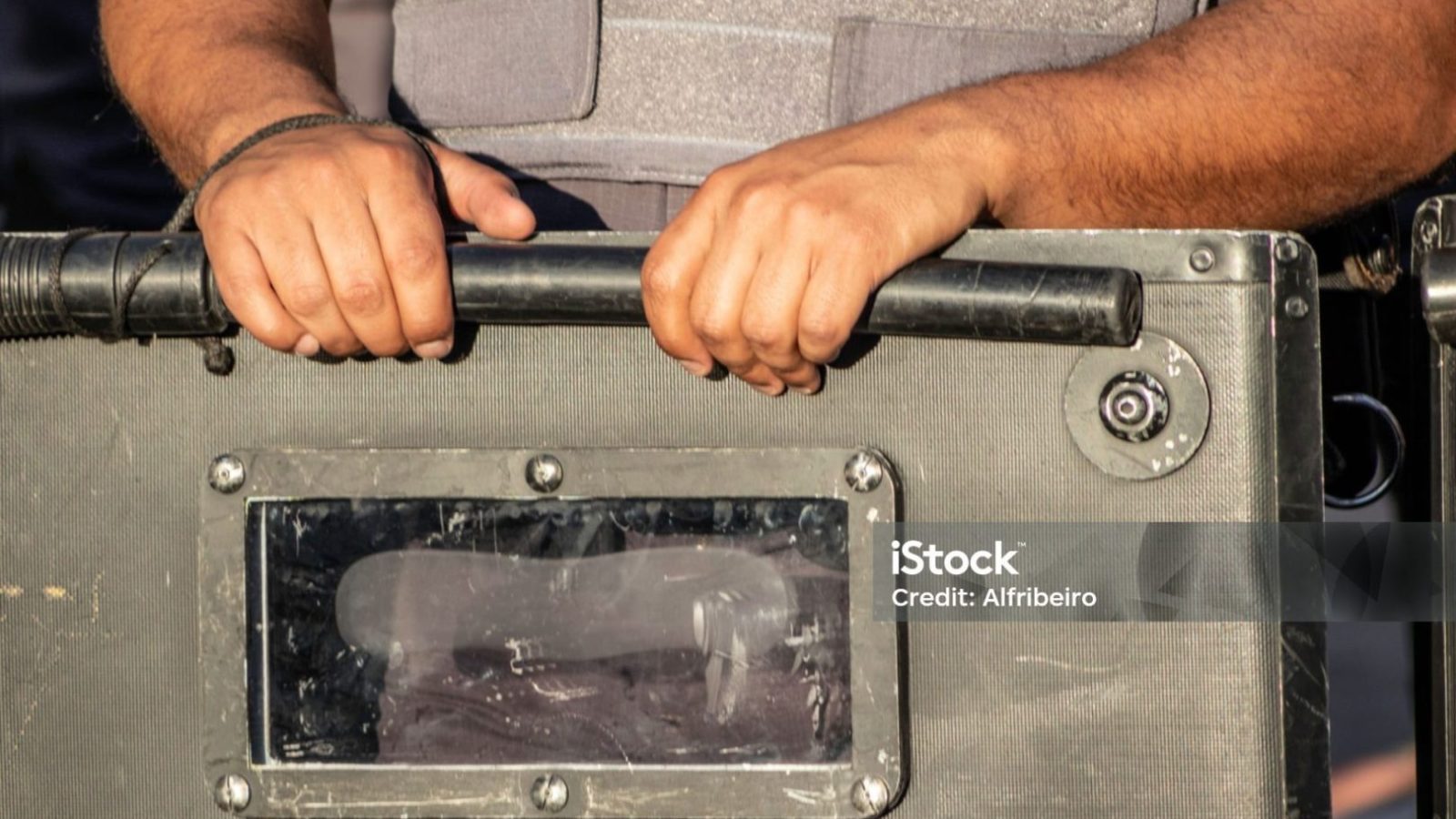 catheter and shield in the hand of a police officer riot in Sao Paulo, Brazil in Sao Paulo